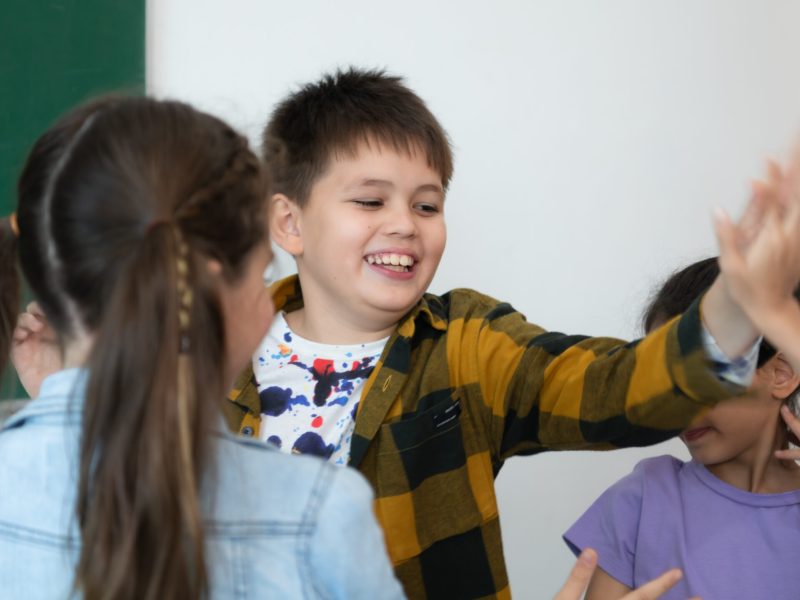 A group of students from an international school that promotes creativity and places children at the center of learning in a variety of subjects.